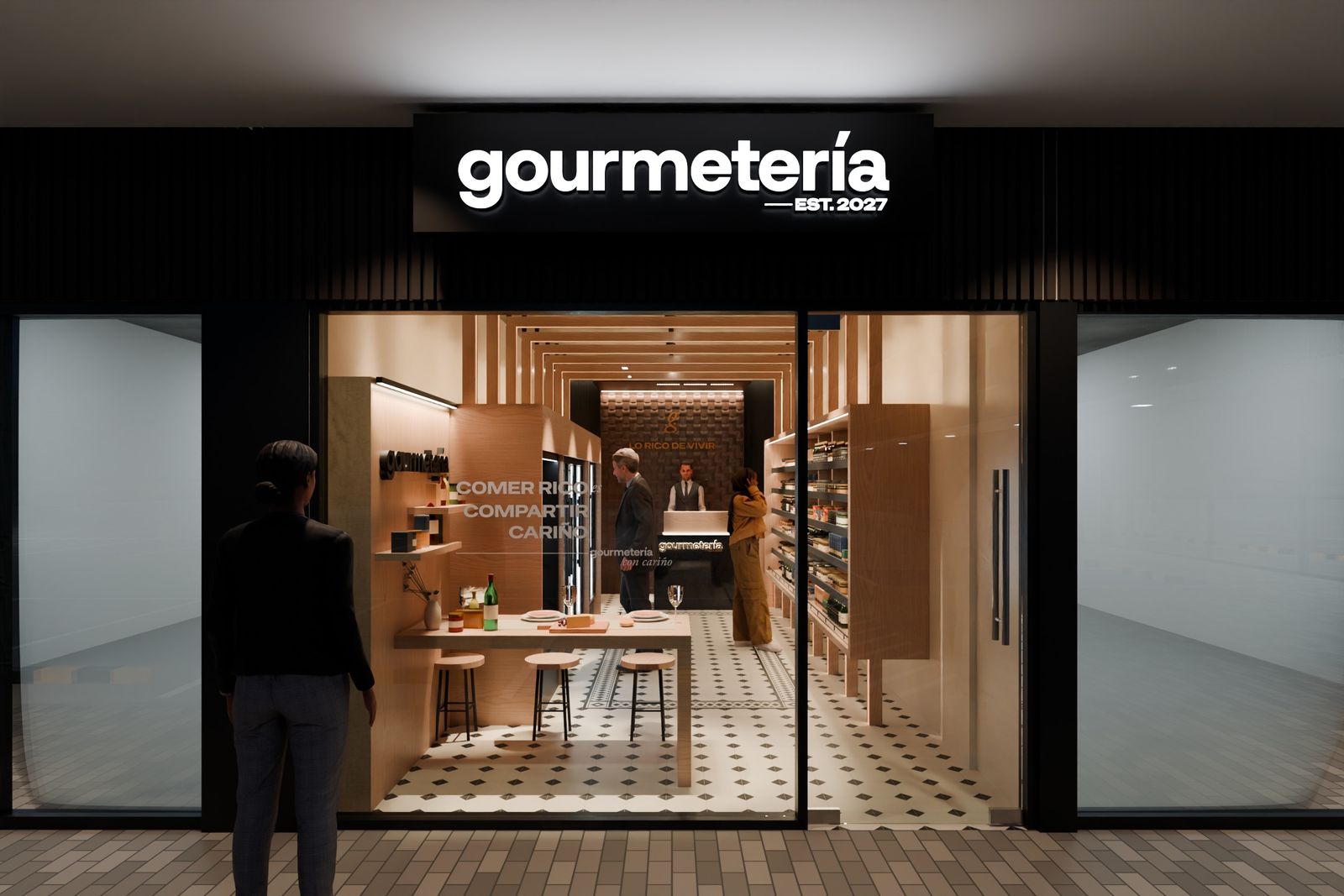 Fachada de la gourmetería de noche