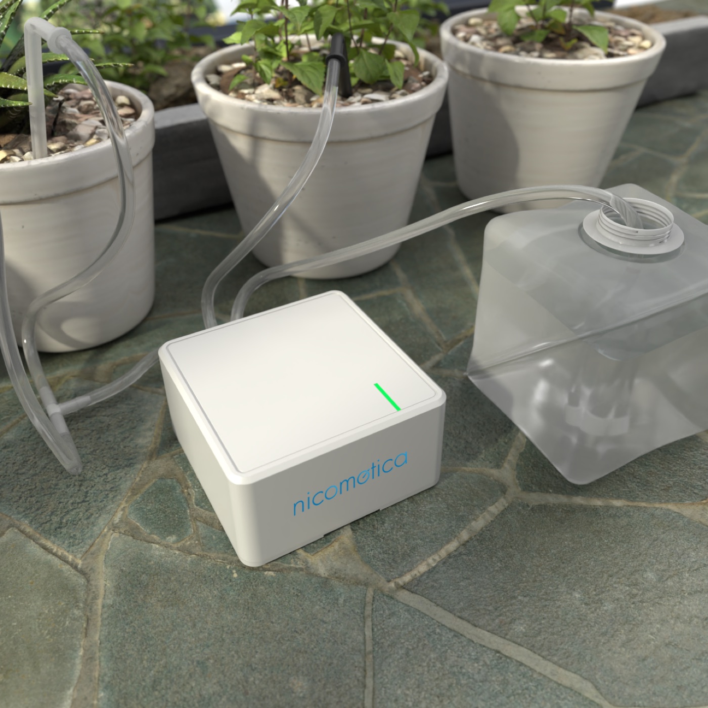 Sistema de riego nicomótica regando plantas en maceta